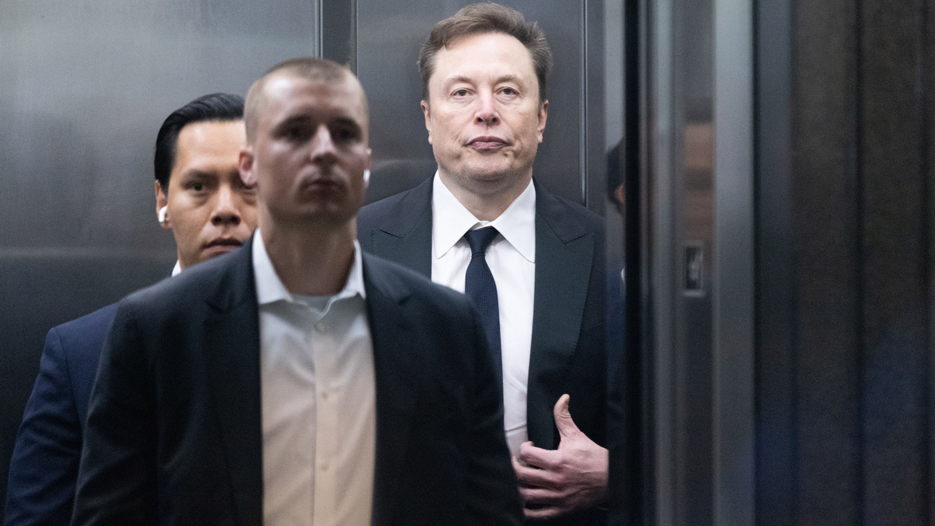 Elon Musk arrives to court at the Ronald V. Dellums Federal Building on April 30, 2026 in Oakland, California. Elon Musk invested in OpenAI early on believing it would be a non-profit, but is now suing OpenAI and its CEO Sam Altman for allegedly deceiving him by developing OpenAI into a for-profit company.